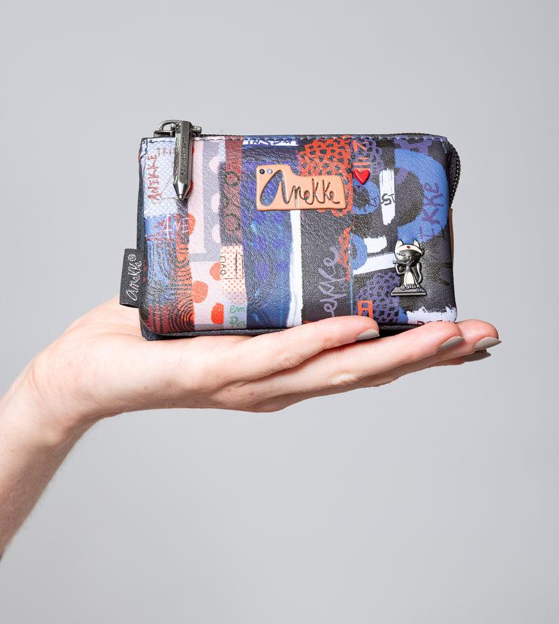 Anekke Kyomu triple purse Ahorra y exporta