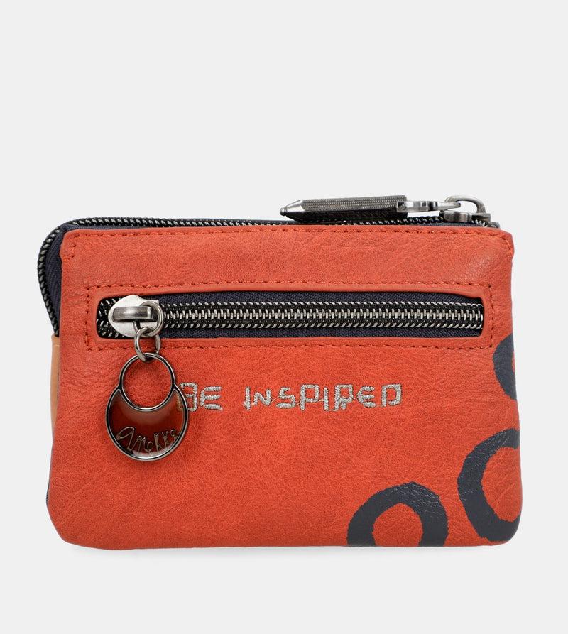 Anekke Kyomu triple purse Ahorra y exporta