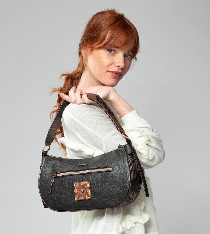 Anekke Shōen oval bag with chain Promoción trimestral