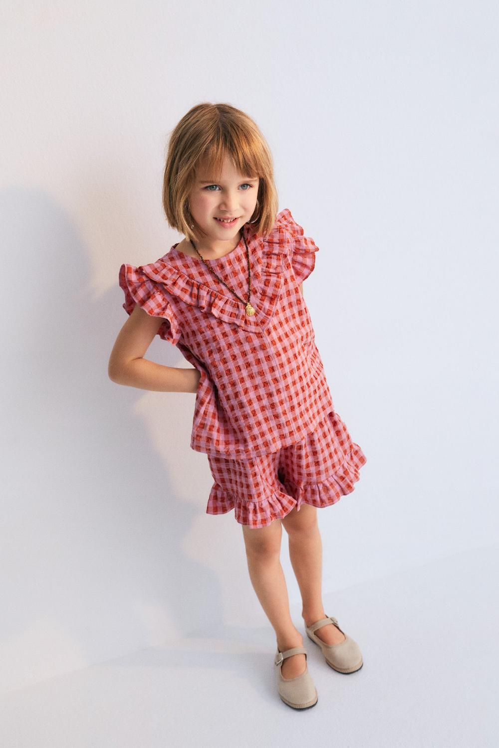 the new society Blusa de iris Ahorra y exporta