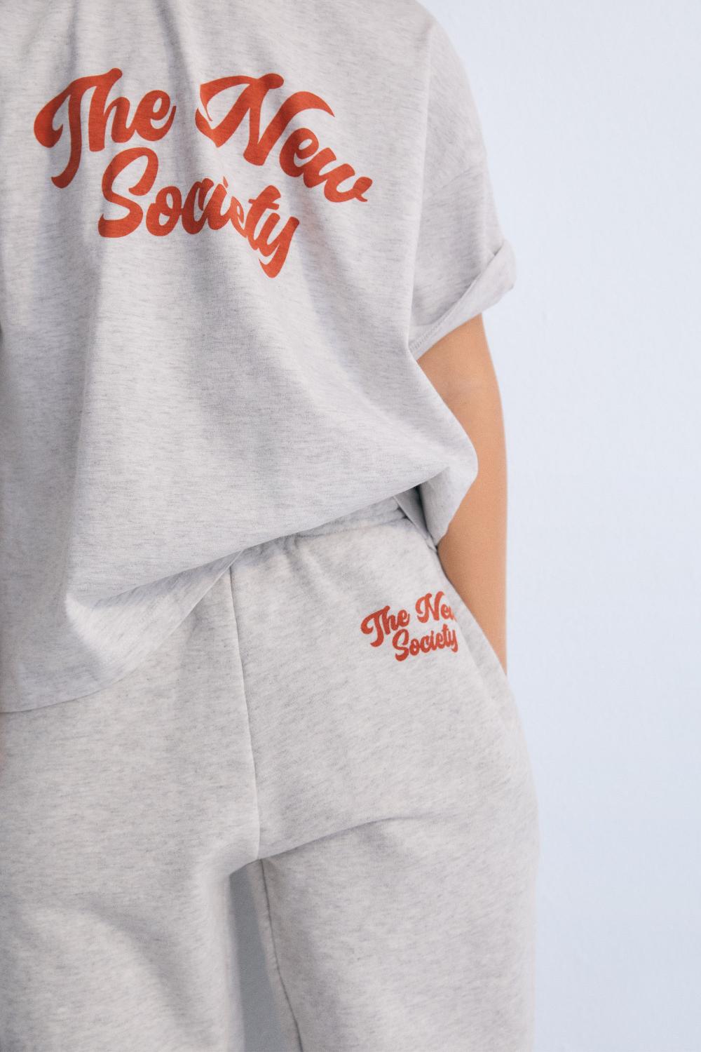 the new society Tee de iOS Devoluciones gratuitas