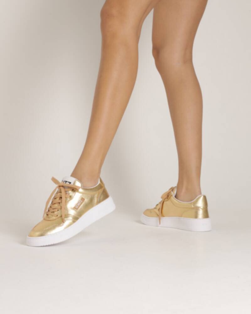 viceversa CHAMPION DORADO Y BLANCO CON CORDONES Liquidación
