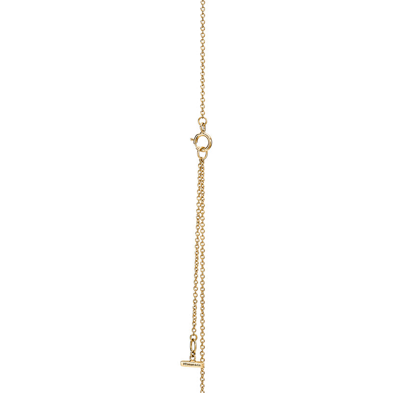 Tiffany & Co. Tiffany T Colgante circular de diamantes y nácar de oro amarillo Grandes descuentos