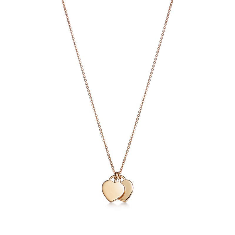 Tiffany & Co. Return to Tiffany™ Colgante con dos insignias de corazón en oro amarillo tamaño mini En oferta