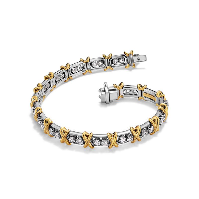Tiffany & Co. Jean Schlumberger by Tiffany Pulsera 36 Stone de platino y oro con diamantes Venta caliente