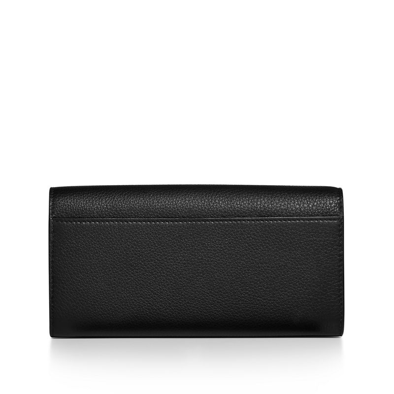 Tiffany & Co. T&CO. Cartera continental de solapa de piel color negro En oferta