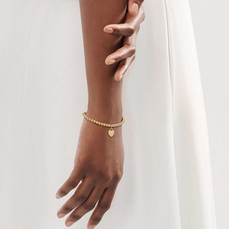 Tiffany & Co. Return to Tiffany™ Pulsera de cuentas con insignia de corazón en oro amarillo Últimos 2 días