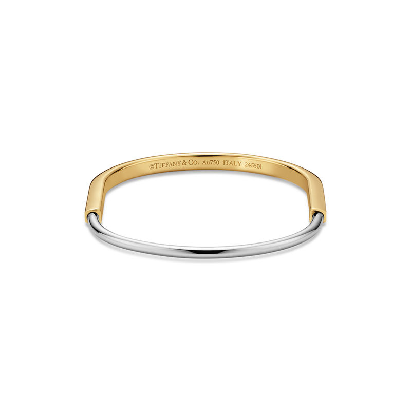 Tiffany & Co. Tiffany Lock Brazalete estrecho de oro amarillo y blanco Ahorra y exporta