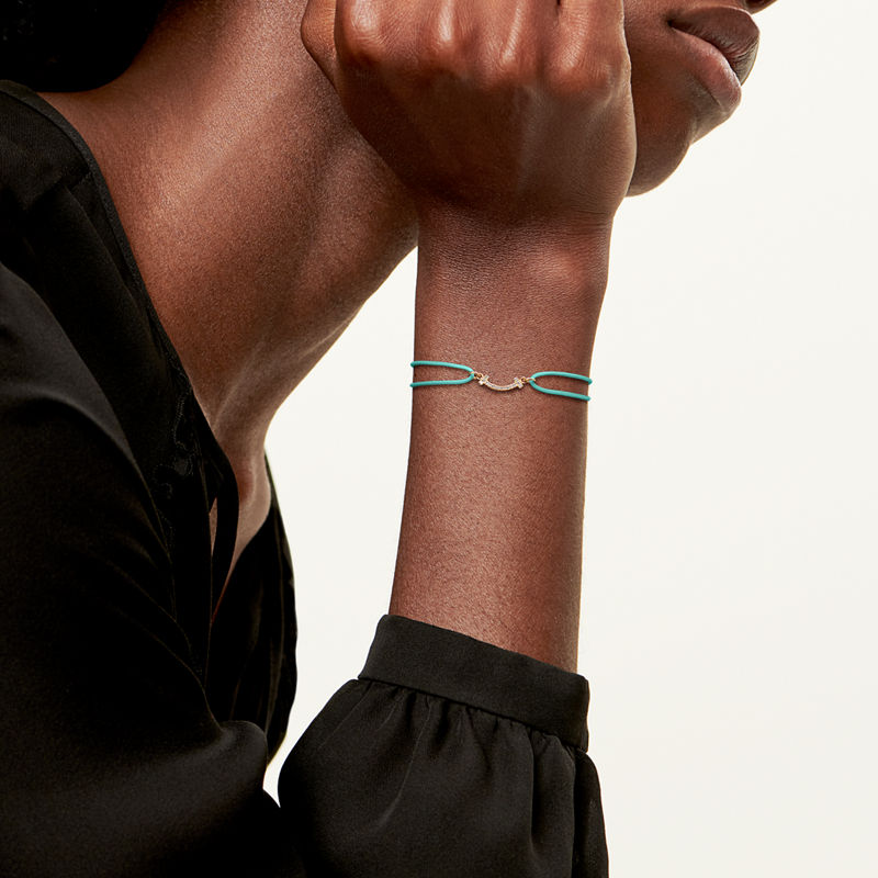 Tiffany & Co. Tiffany T Pulsera Smile de oro amarillo en un cordón de color azul con diamantes Rebajas baratas