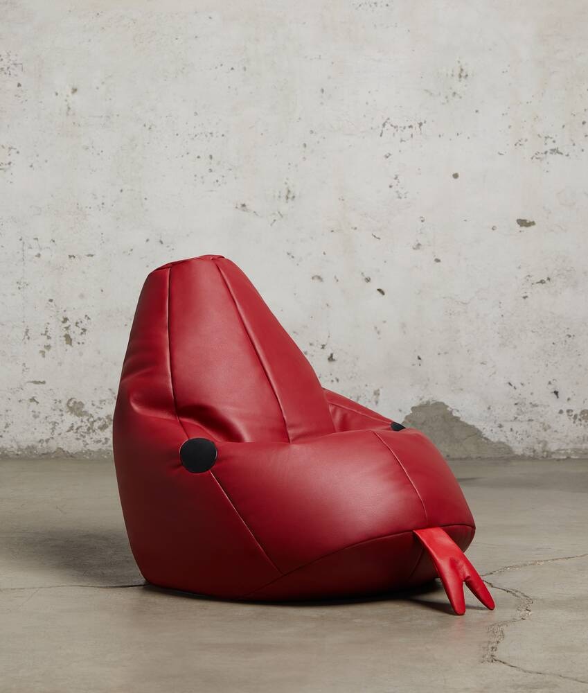 Bottega Veneta Puf pequeño con diseño de serpiente Devoluciones gratuitas