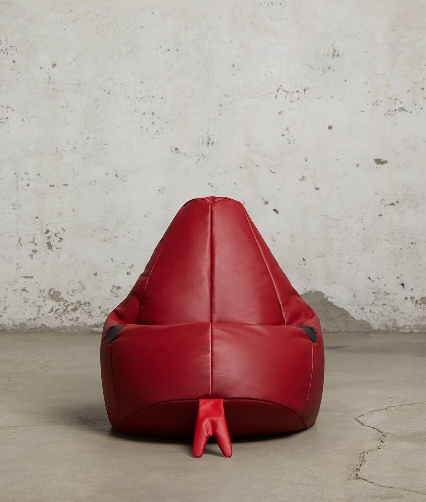 Bottega Veneta Puf pequeño con diseño de serpiente Devoluciones gratuitas